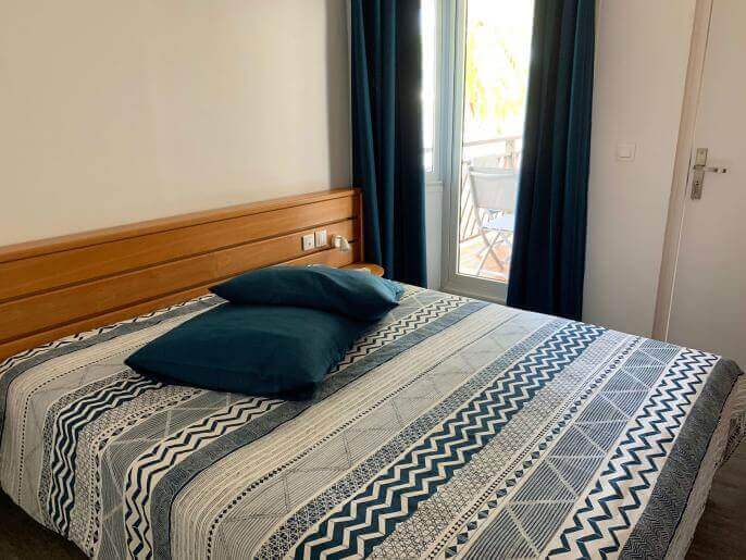 Location Appartement & Villa en Guadeloupe - Chambre avec linge de lit compris