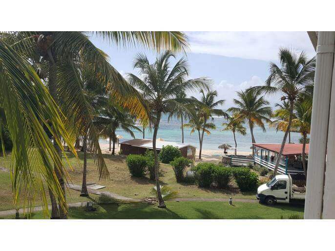 Location Appartement & Villa en Guadeloupe - vue sur la plage gommier 2ème étage