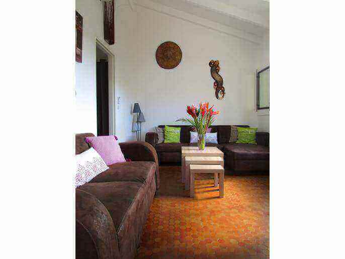 Location VillaAppartement en Guadeloupe - Le salon ( possibilité 4 couchages) 