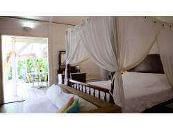 location Maison Villa Guadeloupe - Grande chambre donnant sur la terrasse