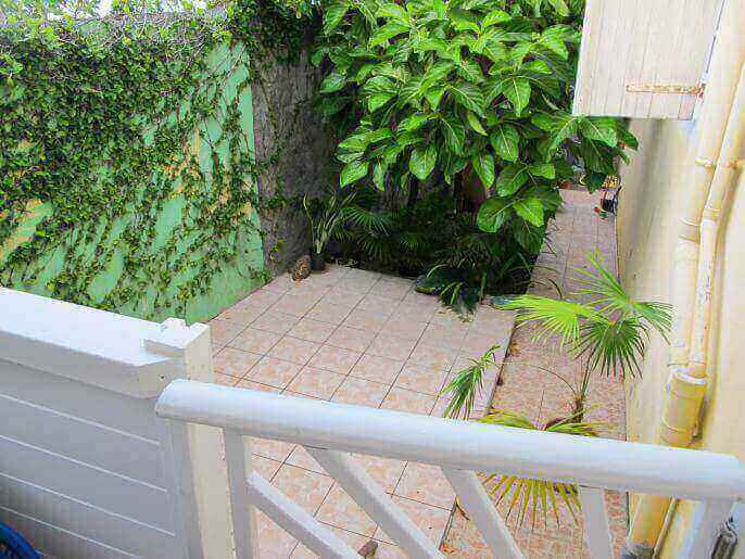 Location Maison/Appartement & Villa en Guadeloupe - Petit jardin d'agrément, petite terrasse non couverte