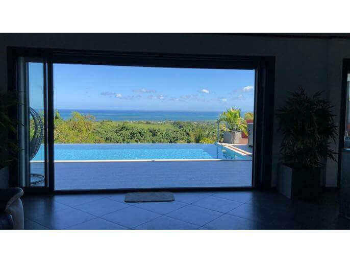 Location VillaMaison en Guadeloupe - Magnifique vue depuis l'intérieur de la villa 